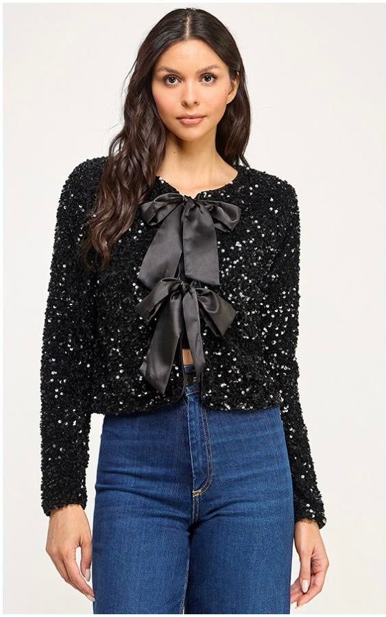 Saco lentejuelas con moño